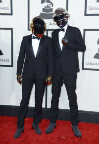 Daft Punk arrives at the 56th annual Grammy Awards at Staples Center on Sunday, Jan. 26, 2014, in Los Angeles. (Photo by Jordan Strauss/Invision/AP)